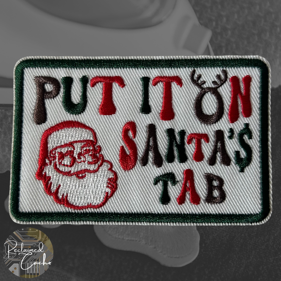 Put It On Santa'$ Tab Iron On Patch
