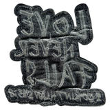 Love Never Fails Iron On Patch