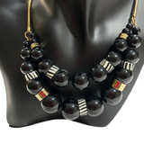 Kenneth Cole Black and Gold Beaded Bib Necklace